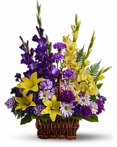 <div class="m-pdp-tabs-description">
<div id="mark-1" class="m-pdp-tabs-marketing-description">Honor rich remembrances of one dearly missed with a vivid mix of blooms that offer strength and comfort alike during a time of sorrow.</div>
</div>
<p id="arrngDescp">Beautiful fresh flowers such as yellow asiatic lilies and gladioli contrast with purple carnations, statice and gladioli, plus lavender carnations and chrysanthemums in a rectangular basket with handle.</p>