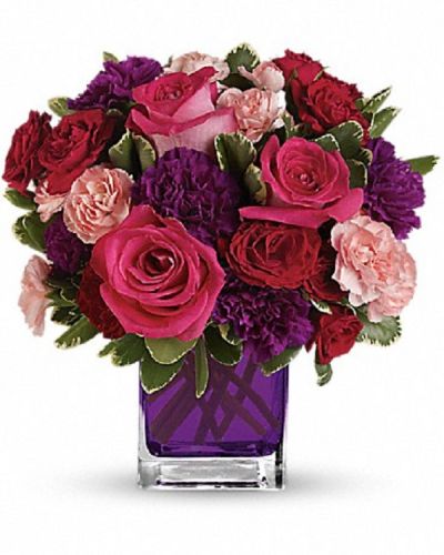 <div class="m-pdp-tabs-description">
<div id="mark-1" class="m-pdp-tabs-marketing-description">Pure romance. Hot pink roses and dark red spray roses are brightly arranged inside a glass cube.</div>
</div>
<p id="arrngDescp">Pink roses, dark red  roses, purple carnations and pink miniature carnations are accented with assorted greens.</p>