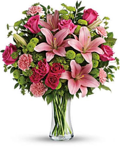 <div id="mark-1" class="m-pdp-tabs-marketing-description">What's better than pink? More pink! Show someone you care with this blissful bouquet of roses and lilies, hand-delivered in a classic glass vase. It's an impressive gift that promises to put some pink in her cheeks!</div>
<div id="desc-1">
<ul>
<li>This fabulously feminine bouquet features hot pink roses, hot pink spray roses, pink asiatic lilies, pink carnations, green button spray chrysanthemums, bupleurum, huckleberry and lemon leaf.</li>
<li>Delivered in a clear glass vase.</li>
</ul>
</div>