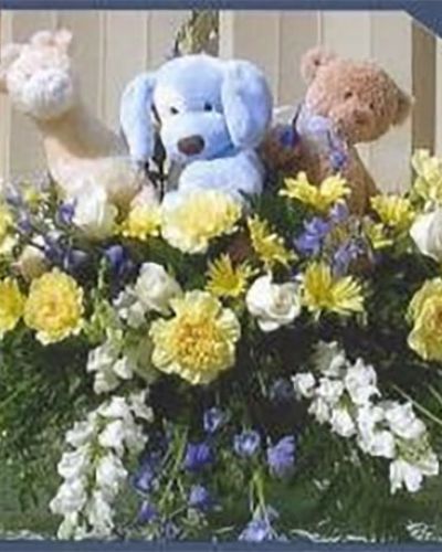 <p>A graceful and magnificent cascade of delicate pale yellow, white, and blue flowers conveys everlasting affection for the radiant spirit being honored, and gently eases sorrow for those paying respect.</p>
<ul id="prodDetailDelivery">
<li><span style="color: red;"><b>Local Delivery Only</b></span></li>
</ul>